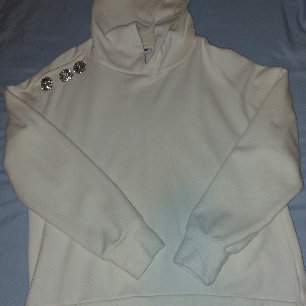 Fashion sweatshirt with rhinestones and hood. Good condition,  used